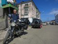 Japaner auf Reisen mit Motorrad